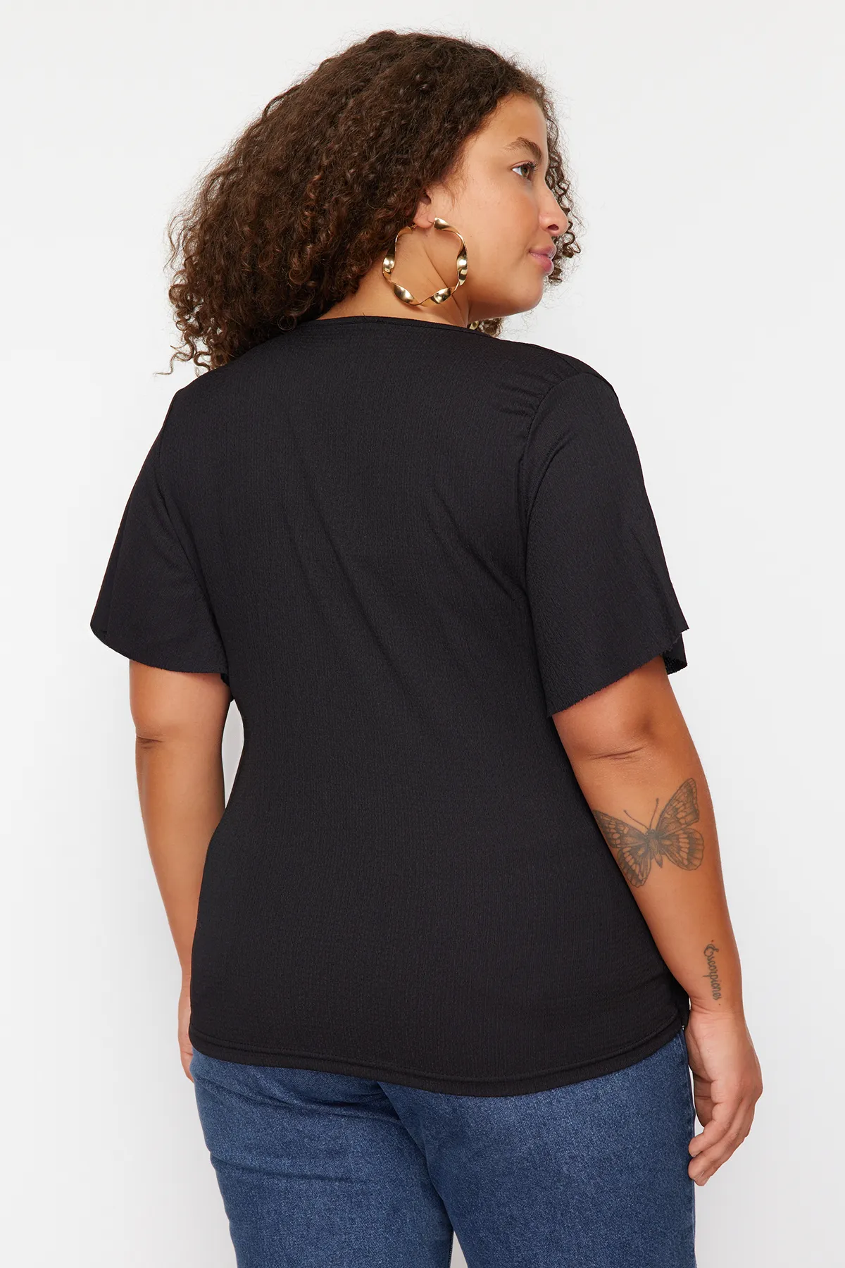 Trendyol Curve  Schwarze zweireihige Strickbluse mit Bindedetail TBSSS23AH00126