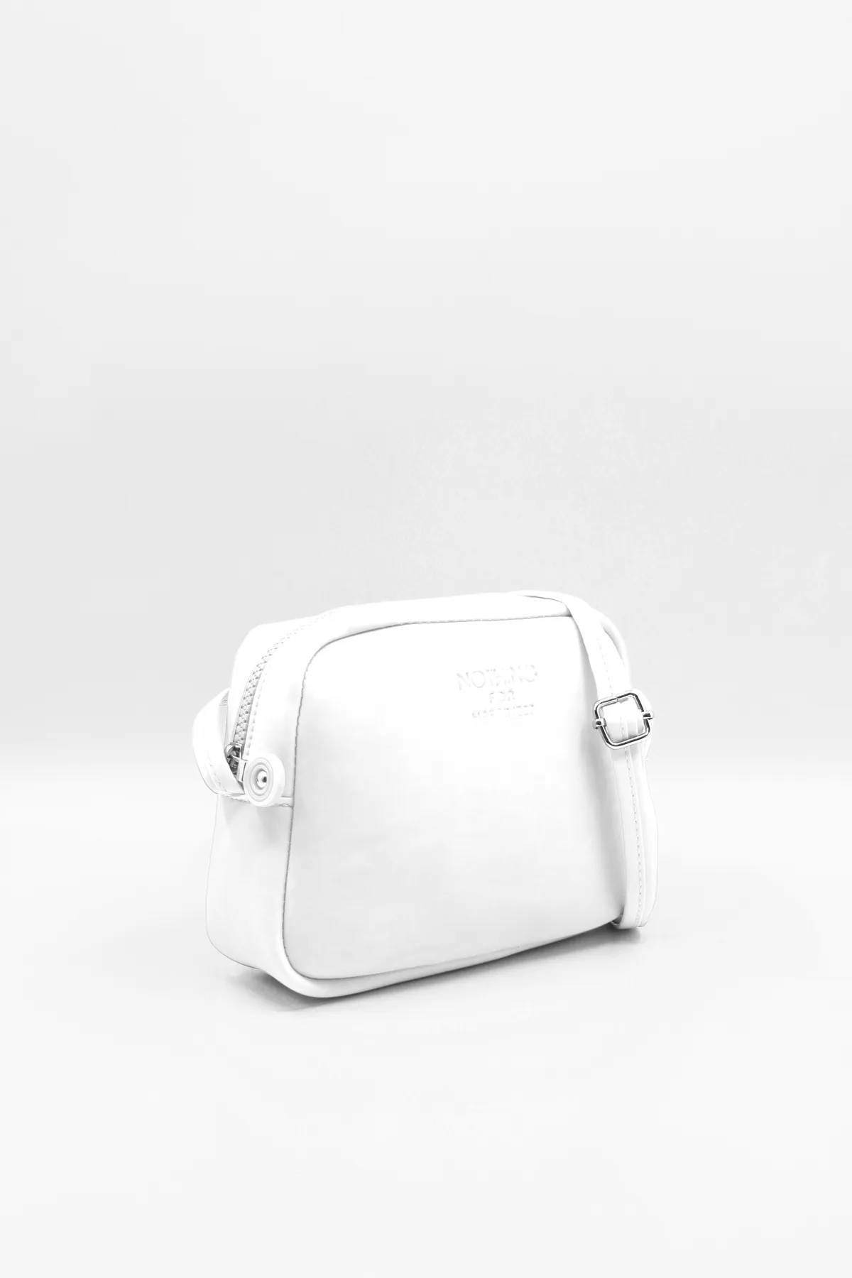 NOTHING  Damen-Handtasche und Umhängetasche Mini Urban Cross Strap mit Reißverschluss und verstellbarem Riemen