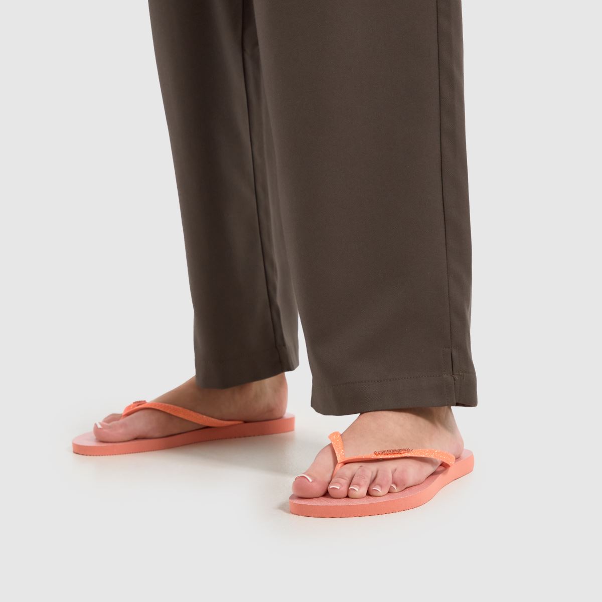 Havaianas – Persikafärgade smala glitter-sandaler med skimrande look