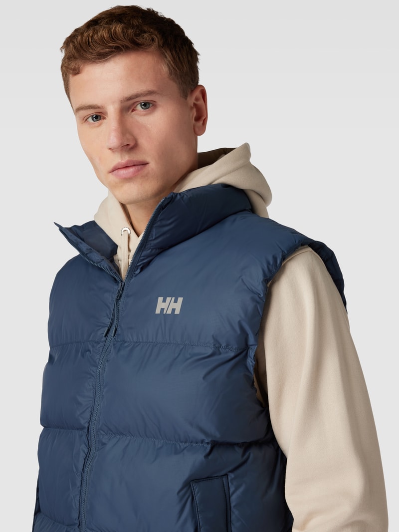 Steppweste mit Stehkragen und Eingrifftaschen in blau