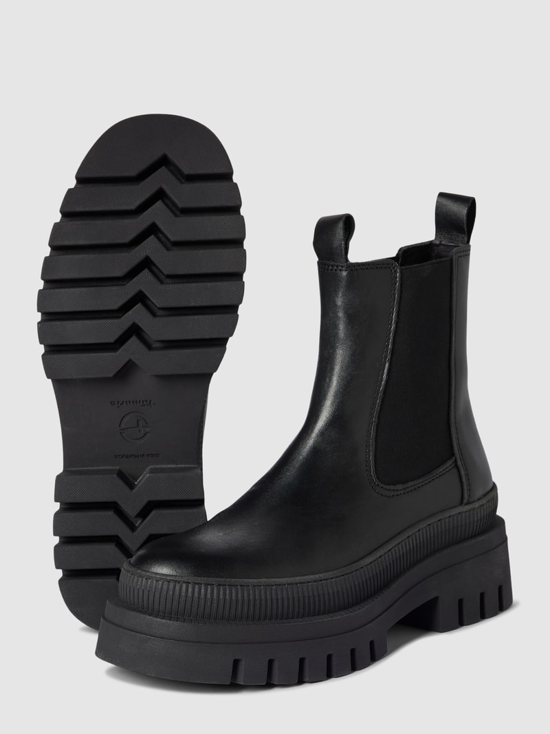 Boots aus Leder mit profilierter Sohle in schwarz