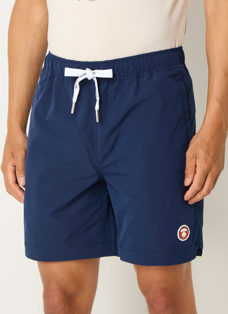 Pantaloni slim fit cu logo-ul Aape con
