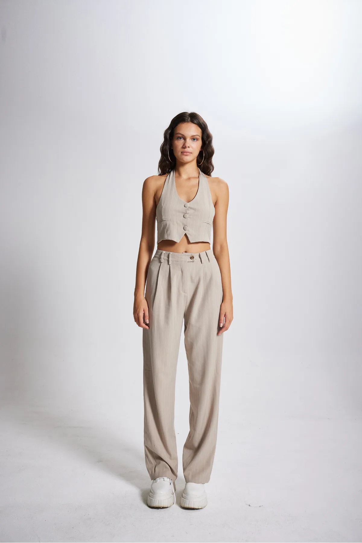HOLLY LOLLY  Gestreifte Stoffhose mit hoher Taille in Beige
