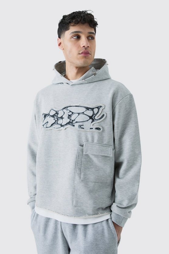 Kastiger Oversize Hoodie mit zerrissener Applikation