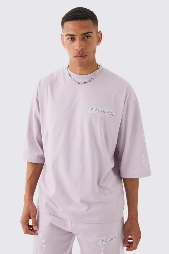 Oversize T-Shirt mit Graffiti-Print und Farbspritzern