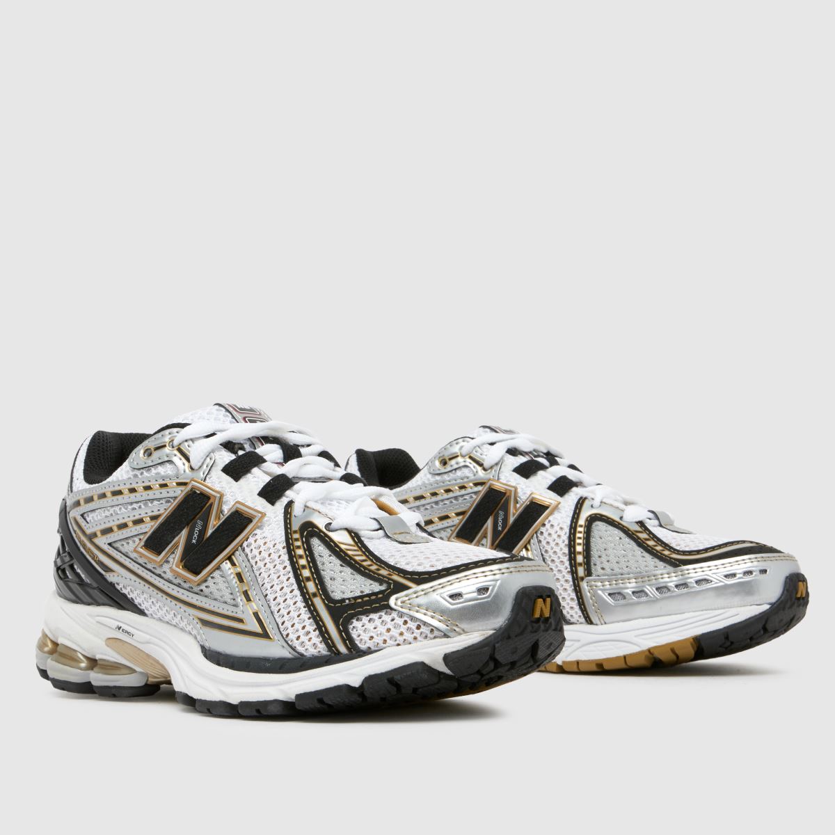 New Balance 1906r träningsskor i svart och guld