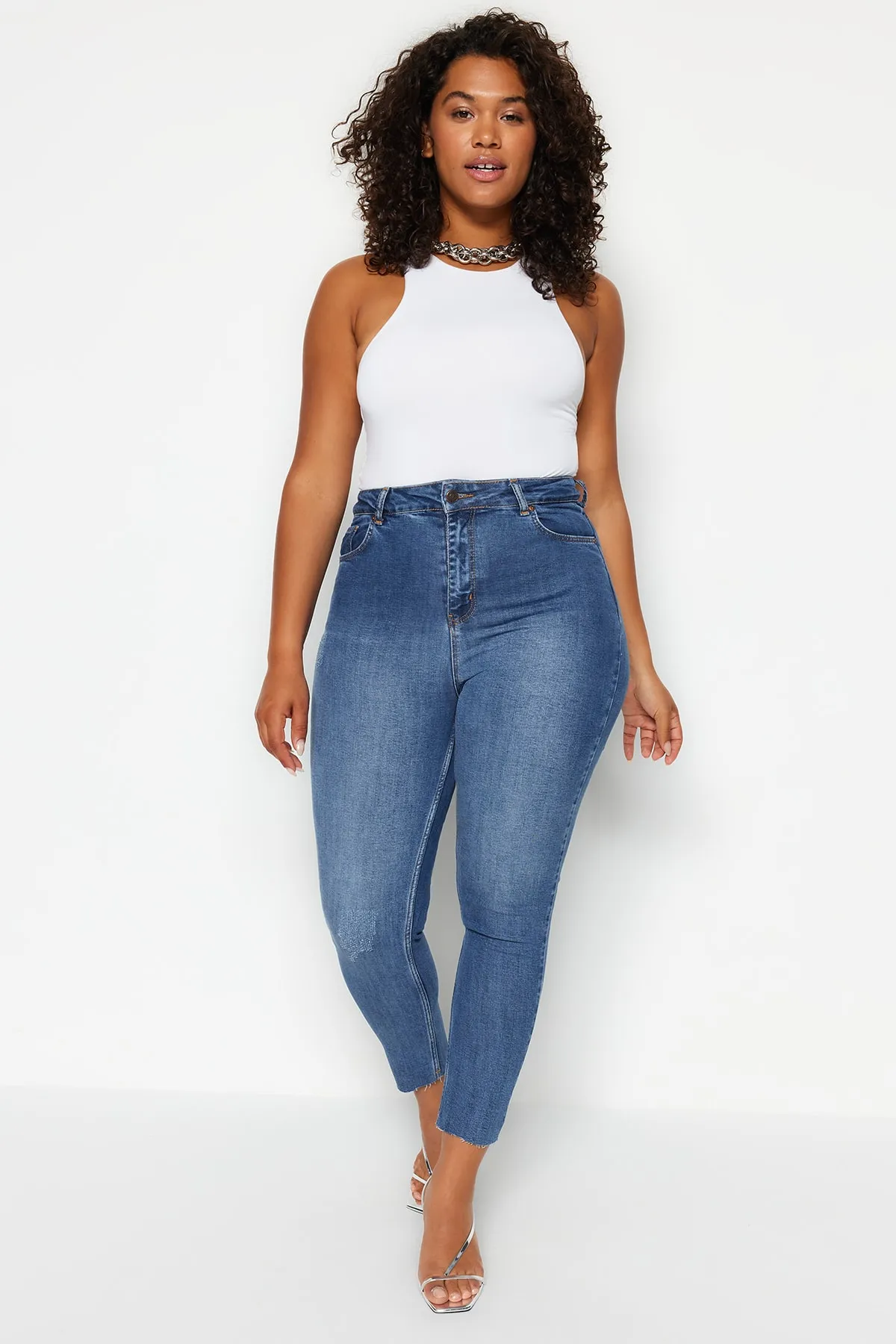 Trendyol Curve  Blaue High Waist Destroy Detaillierte Stretch-Skinny-Jeans TBBSS23CJ00012