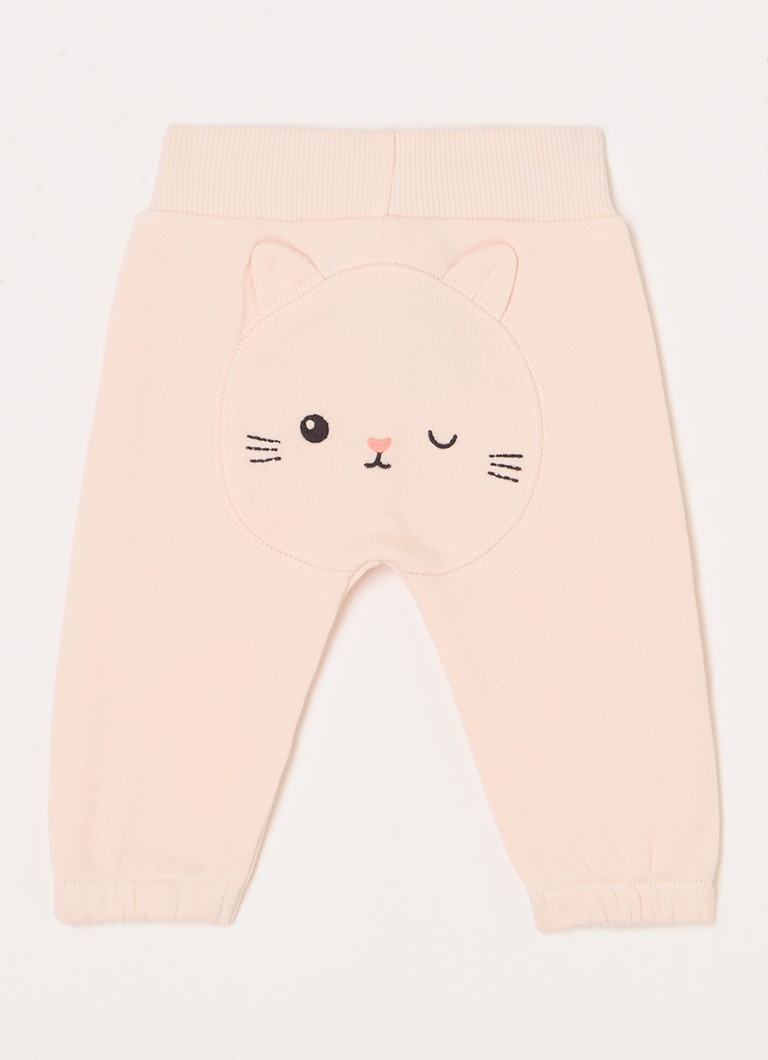 Pantaloni de trening Benetton cu croială conică și broderie.