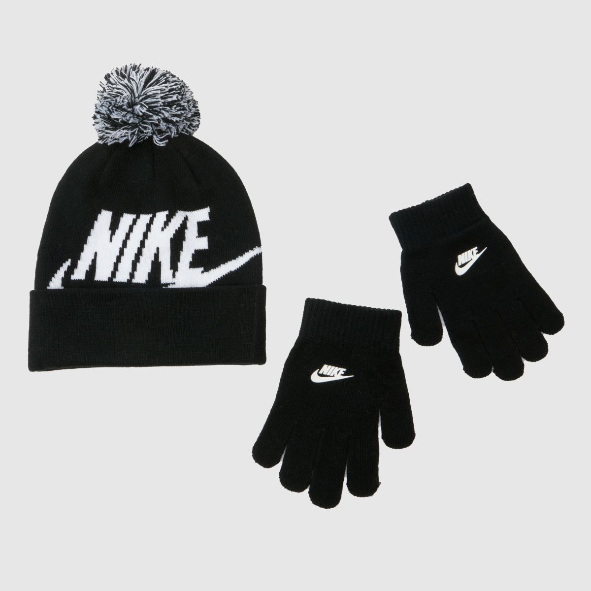 Nike svartvitt set med swoosh-pom-mössa för barn