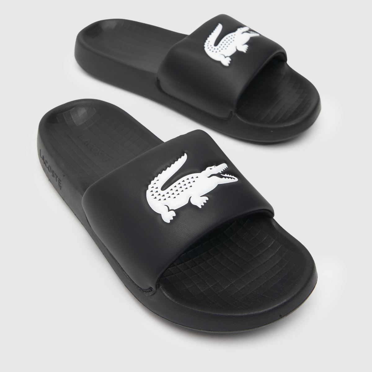 Lacoste – Serve 1.0 – Svarta och vita sandaler