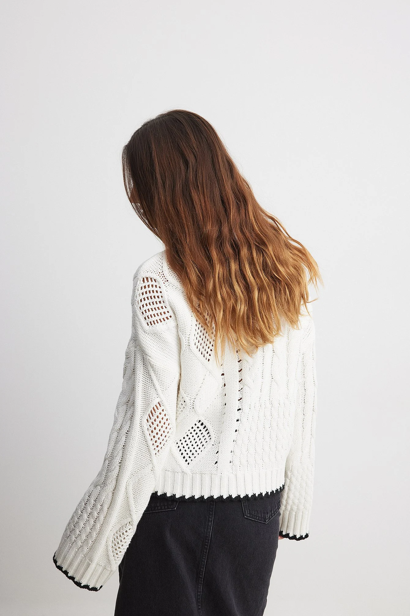 Strickpullover mit Zopfmuster