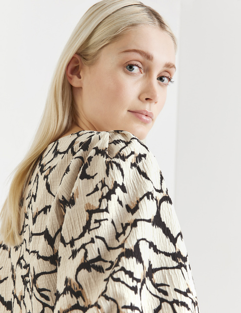 Bluse mit Puffärmeln