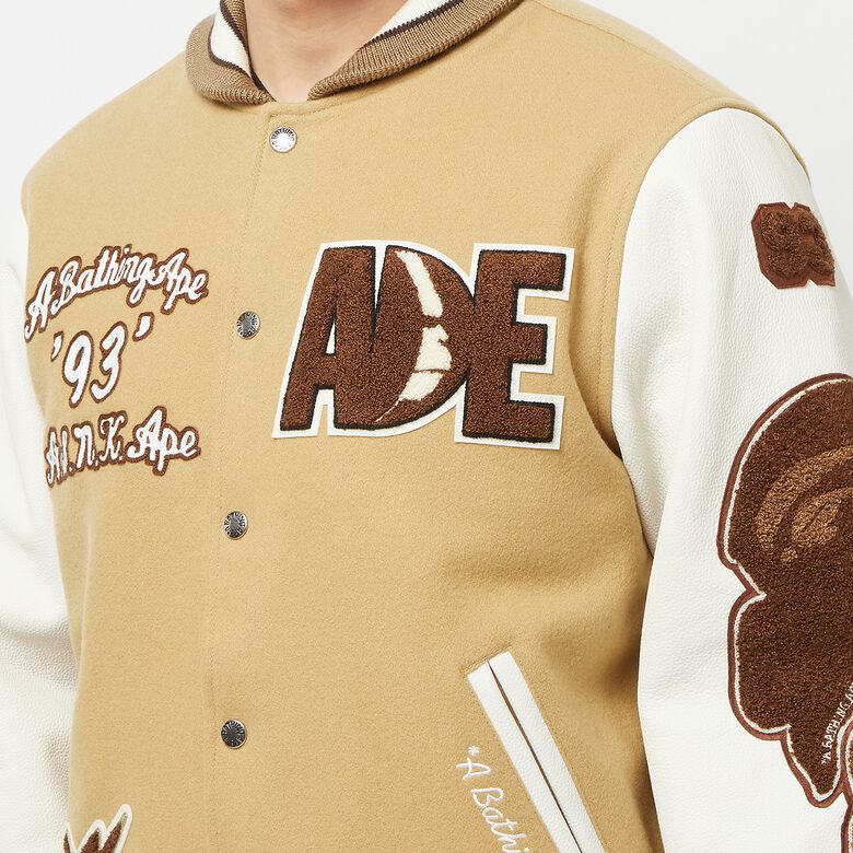 A Bathing Ape Multi Motif Varsity Jacket beige