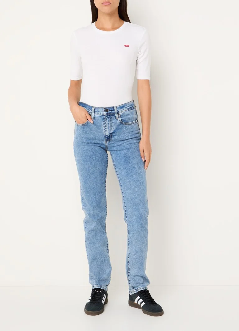Blugi Levi's 724 slim fit cu talie înaltă, confecționați dintr-un amestec de lyocell cu spălare medie.