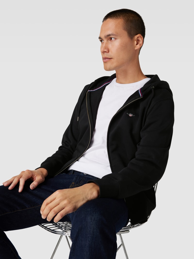 Sweatjacke mit Kapuze in schwarz