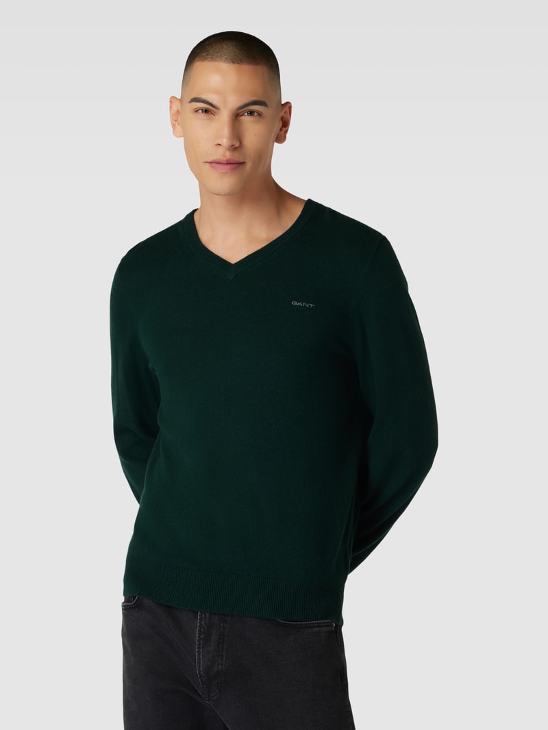 Strickpullover aus Lammwoll-Mix mit V-Ausschnitt in dunkelgrün