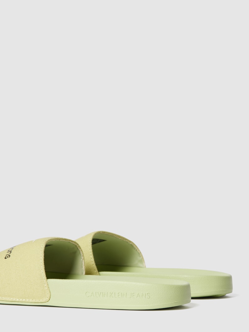 Slides mit Label-Print in neon gelb
