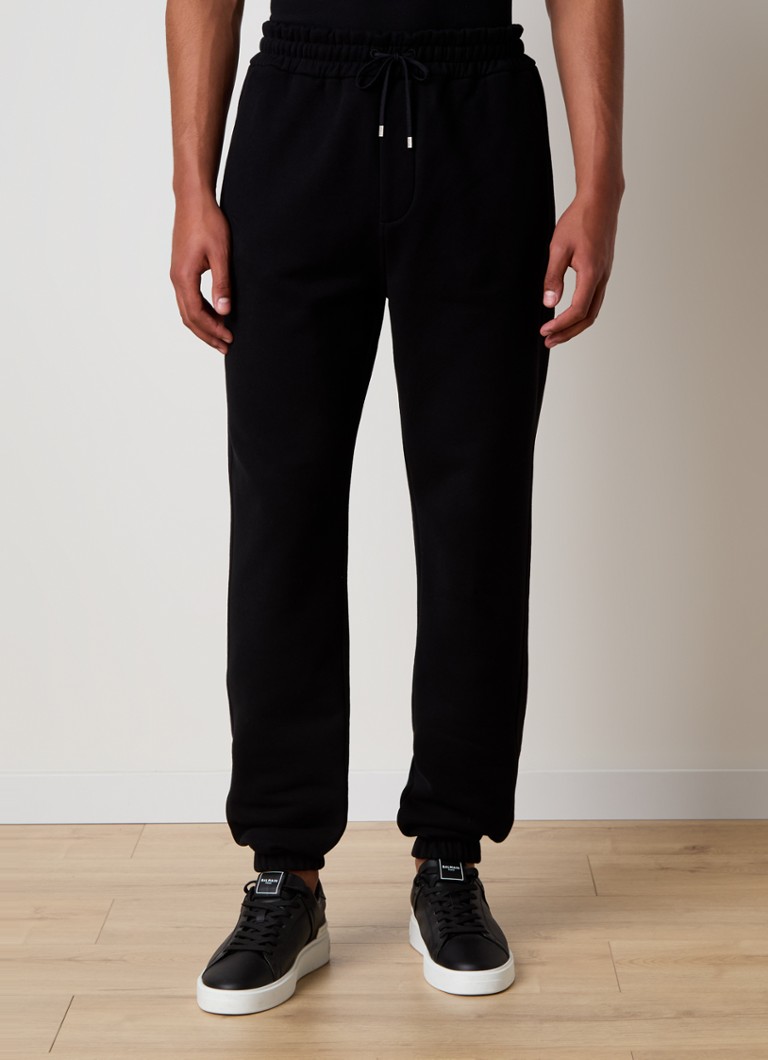 Saint Laurent sašaurinātas piegriezuma sporta bikses ar logotipu