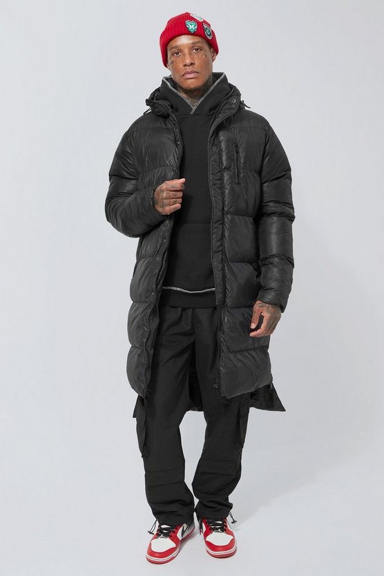 Lange Steppjacke mit Saum-Detail