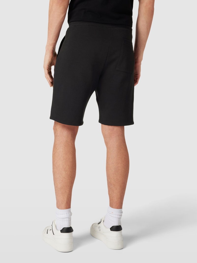 Shorts mit seitlichen Eingrifftaschen Modell 'REVERSIBLE' in schwarz