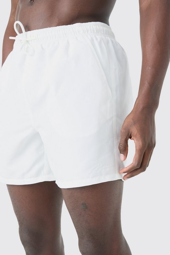 Man Signature mittellange Badehose