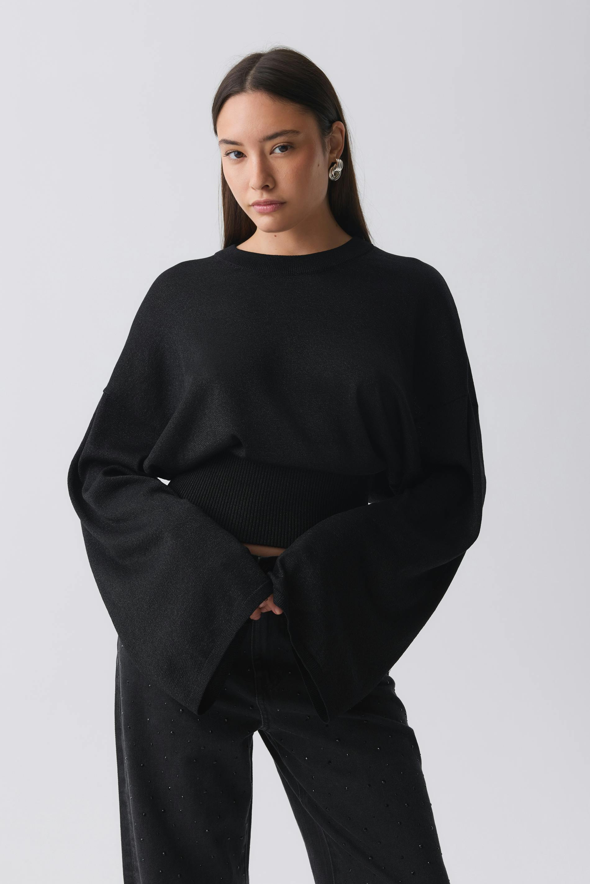 Knitted metallic top