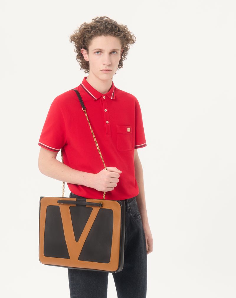 Polo de piqué de algodón con parche VLogo