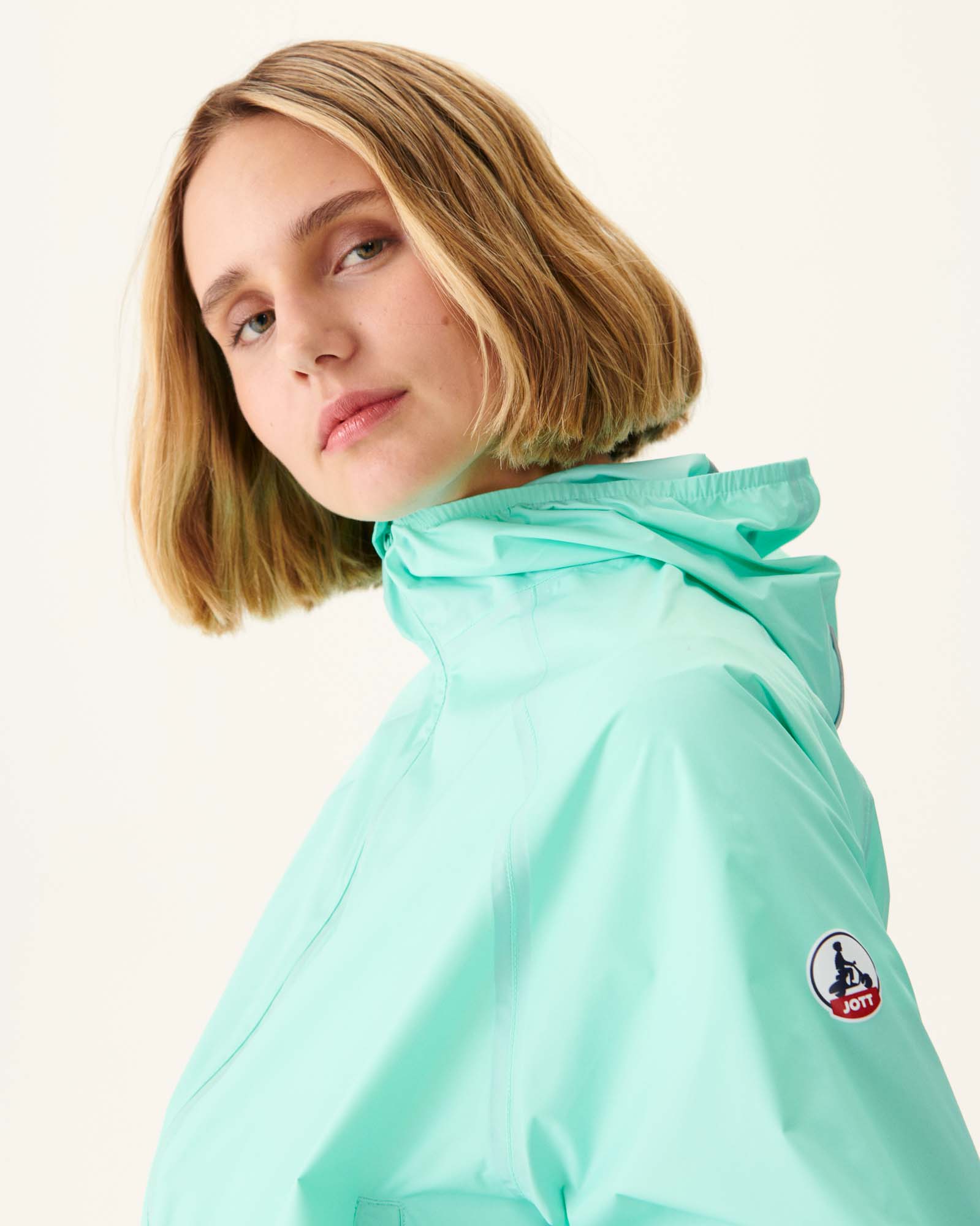 Imperméable à capuche Menthe pastel Singapore