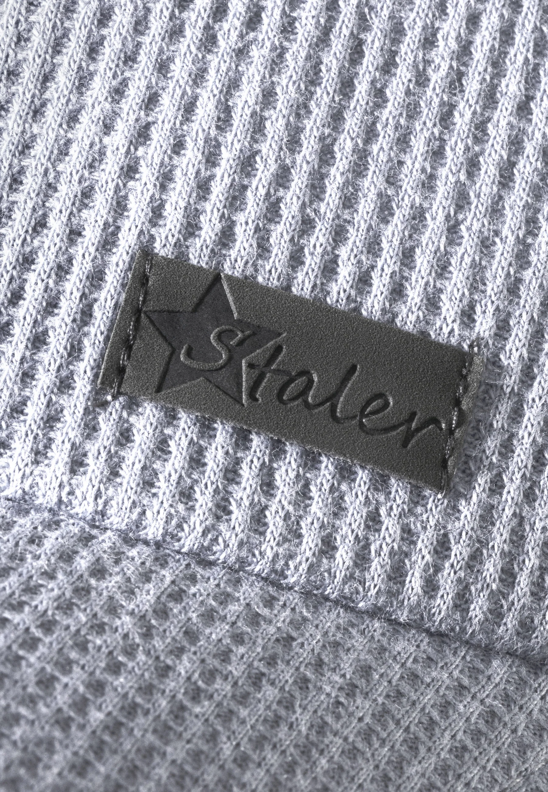 Baseballcap aus Waffelpique in Unifarben mit Logo-Patch
