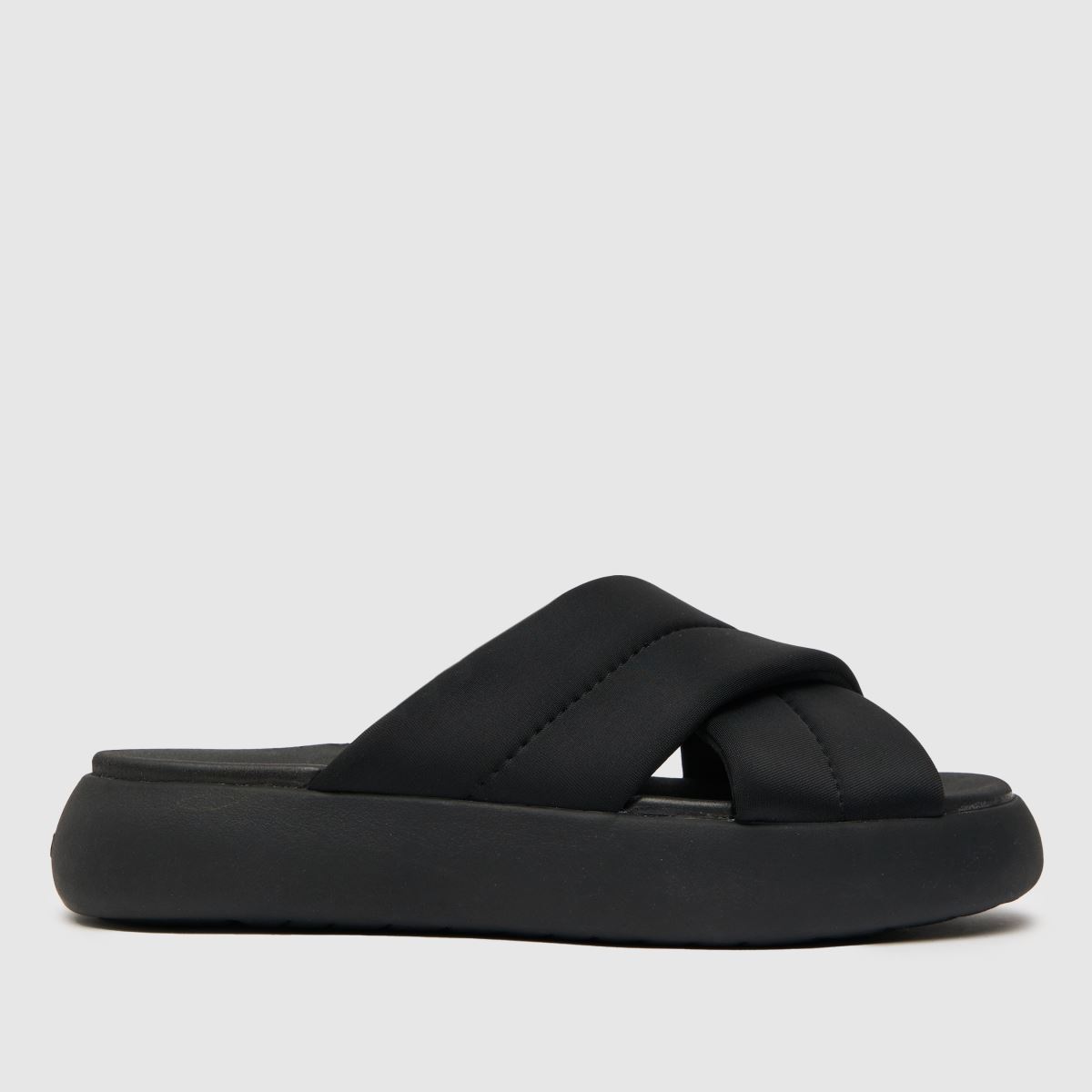 TOMS – Svarta sandaler med crossovermönster från alpagarta i mallow-modell