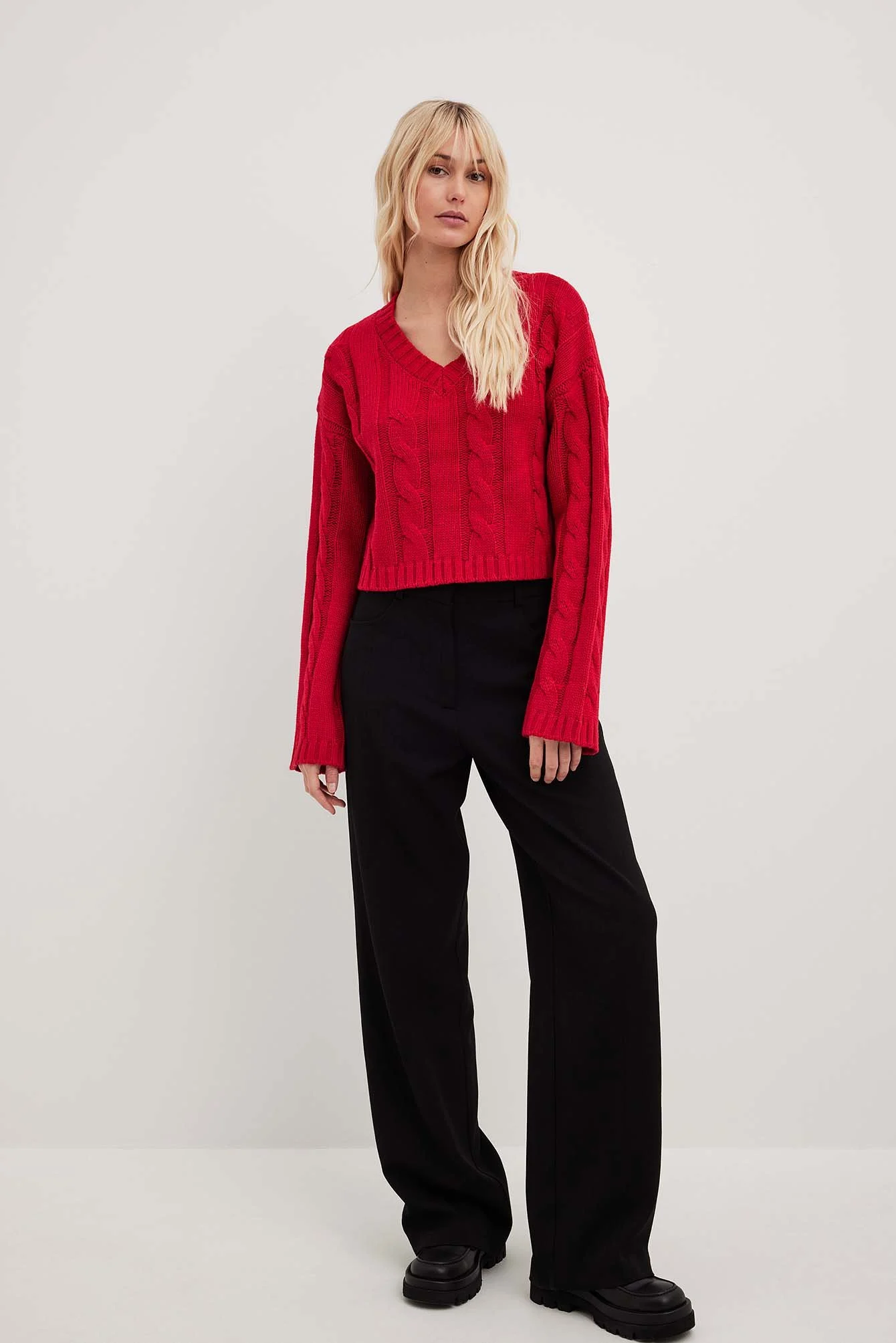 Strickpullover mit Zopfmuster