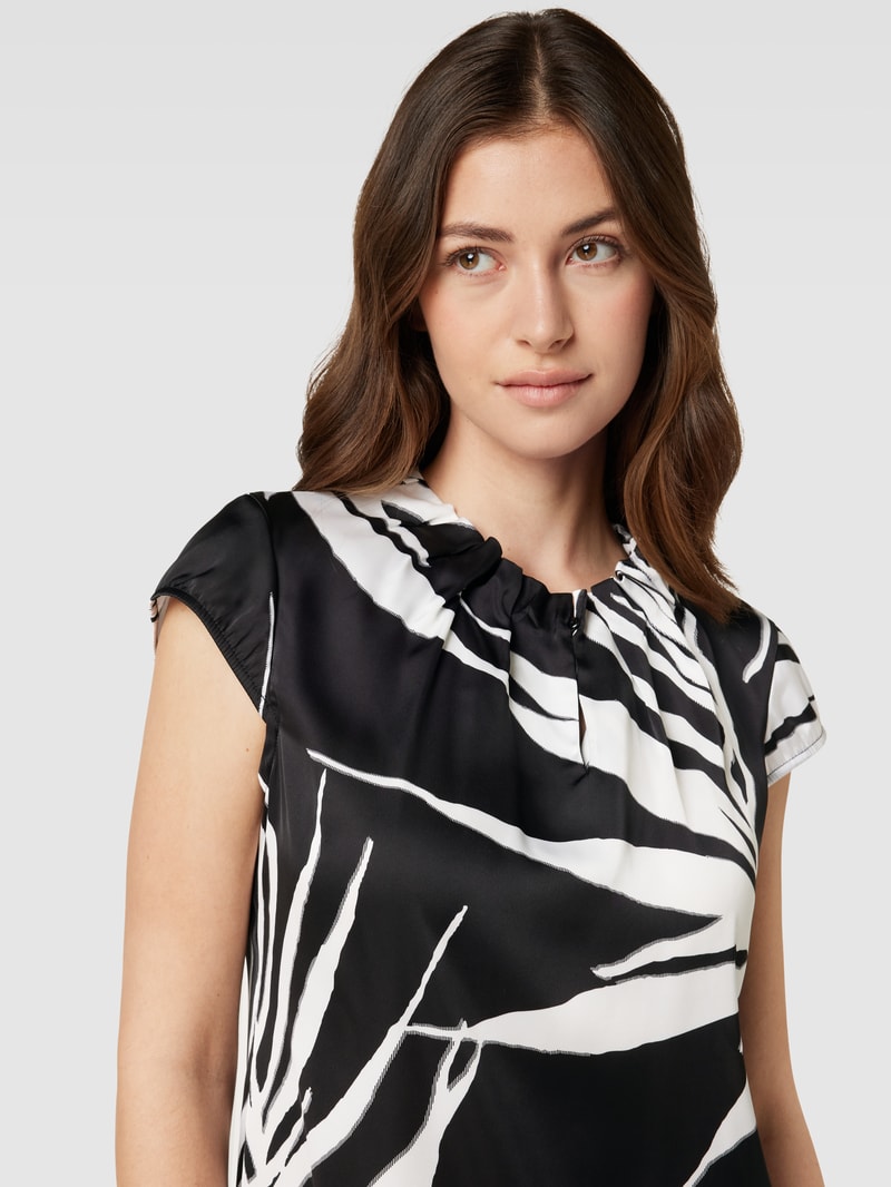 Blusenshirt mit Allover-Muster in schwarz