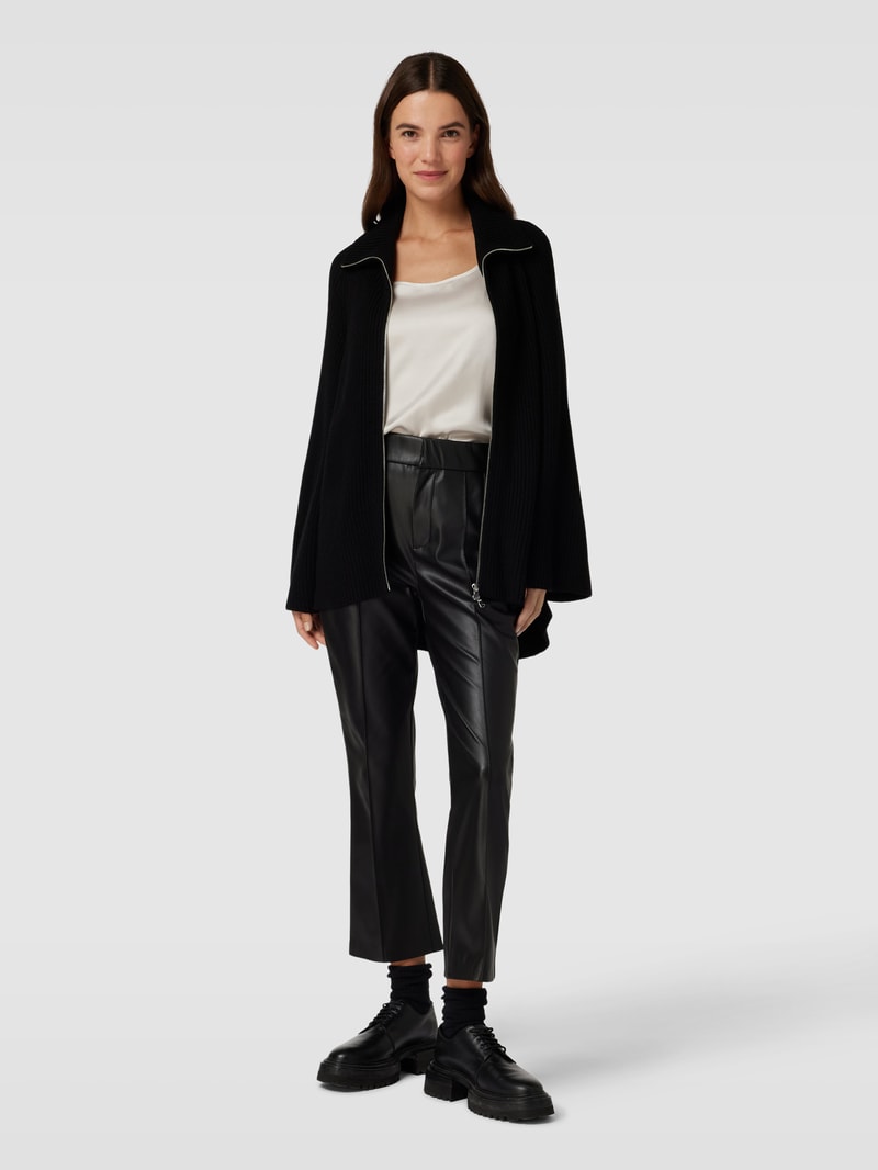 Oversized Strickjacke mit Lochmuster in schwarz