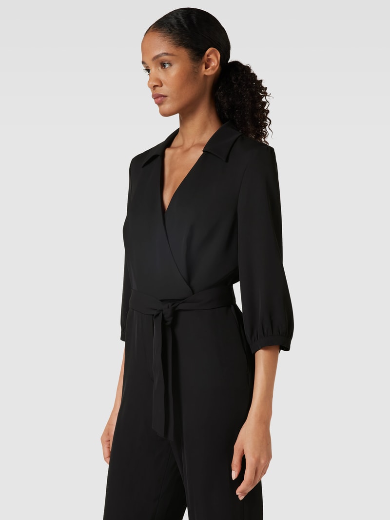 Jumpsuit mit Bindegürtel in schwarz