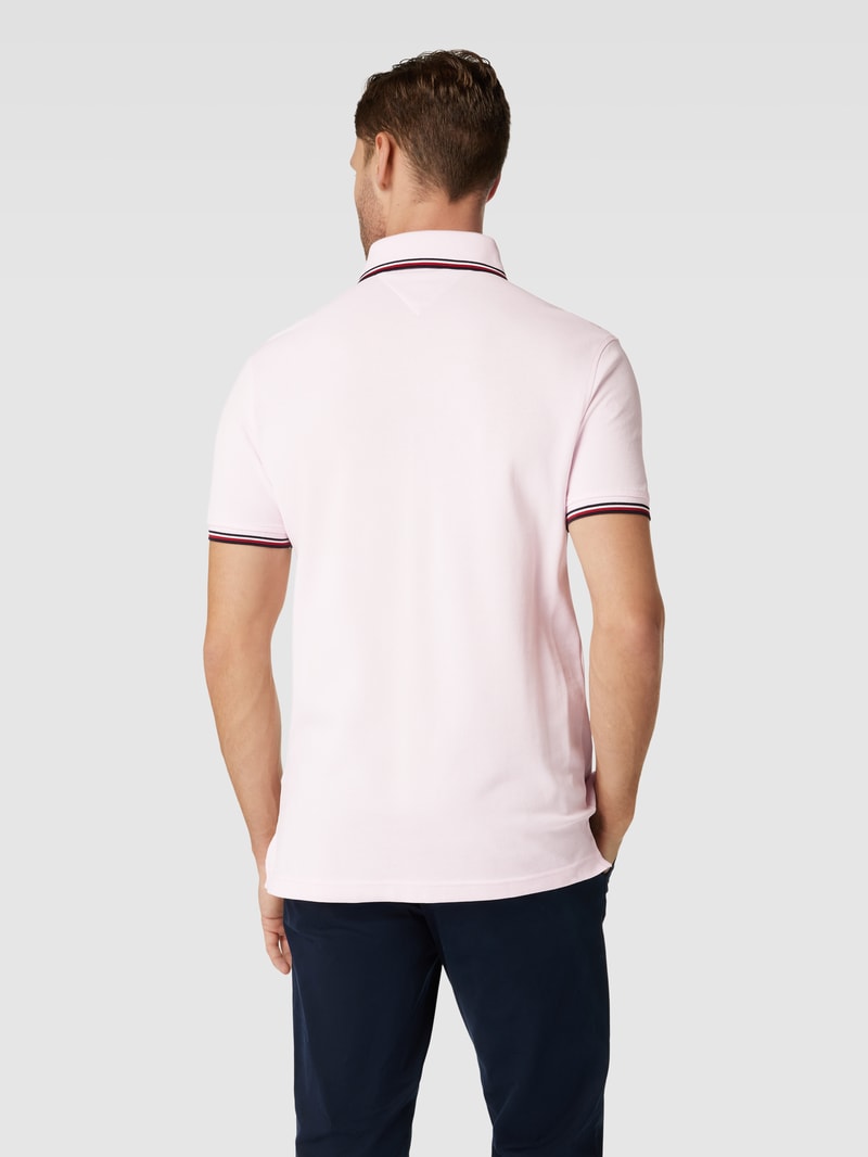 Poloshirt mit Kontraststreifen in koralle