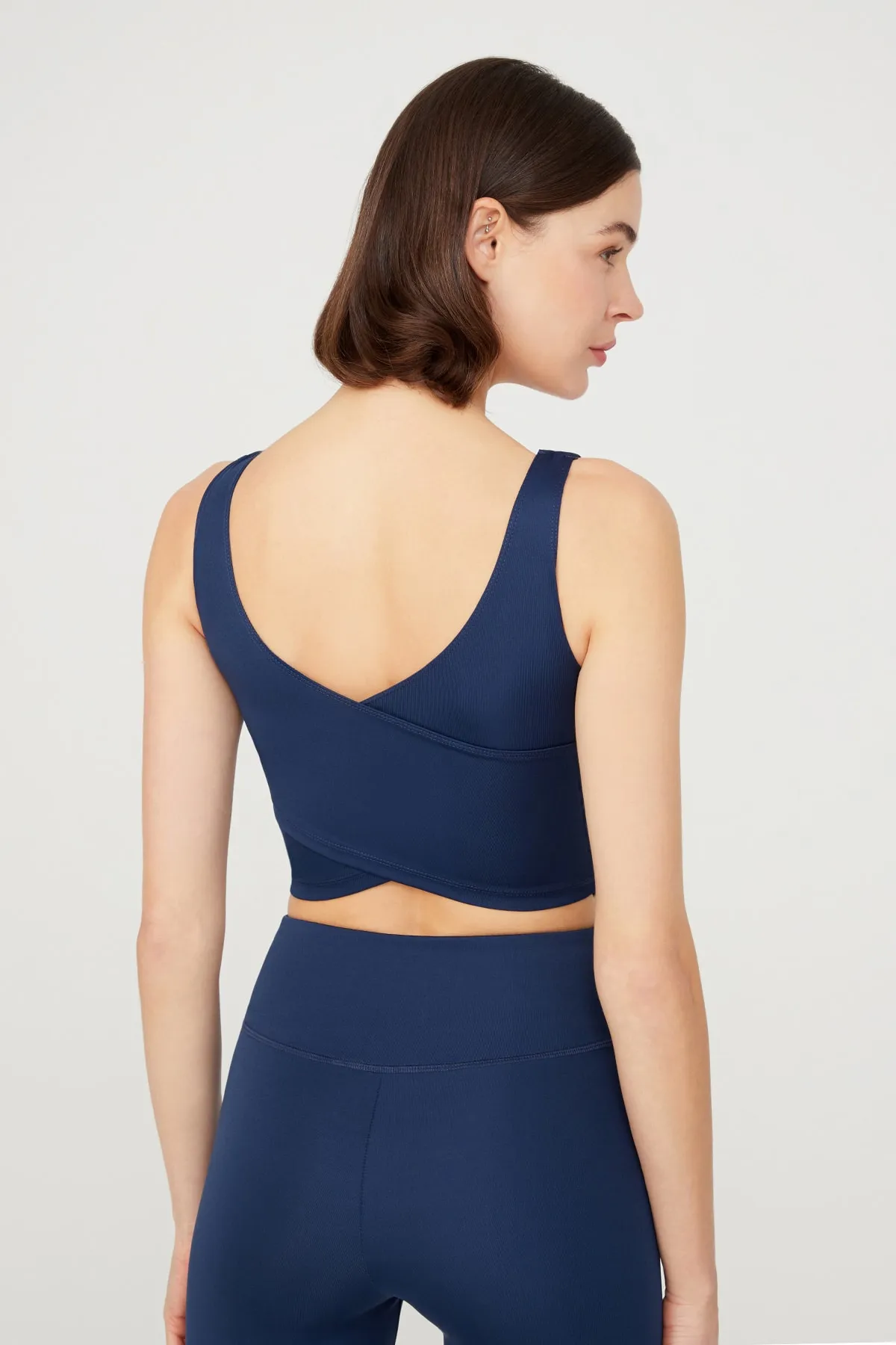 LOS OJOS  Marineblaues, leicht unterstütztes Bustier-Crop-Top mit Ausschnitt am Rücken