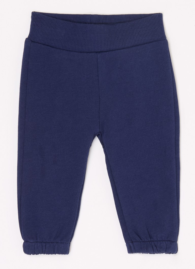 Pantaloni de trening Benetton cu croială conică și broderie.