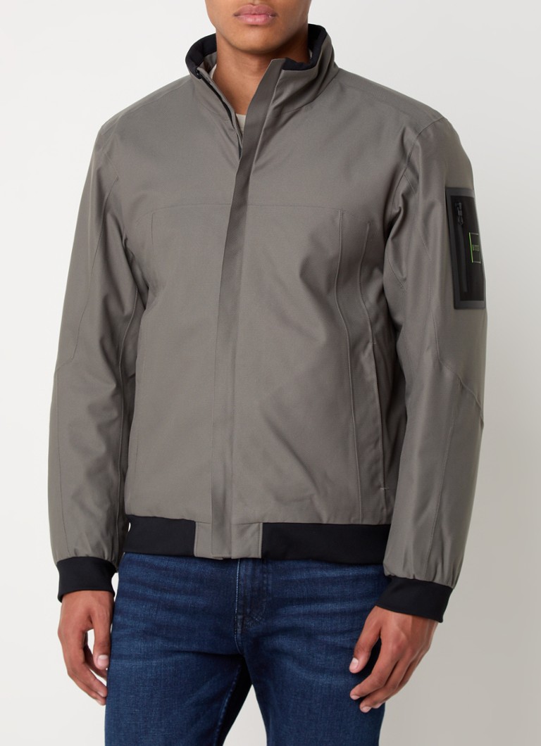 Vetrovka HUGO BOSS Jord s vreckami na zips