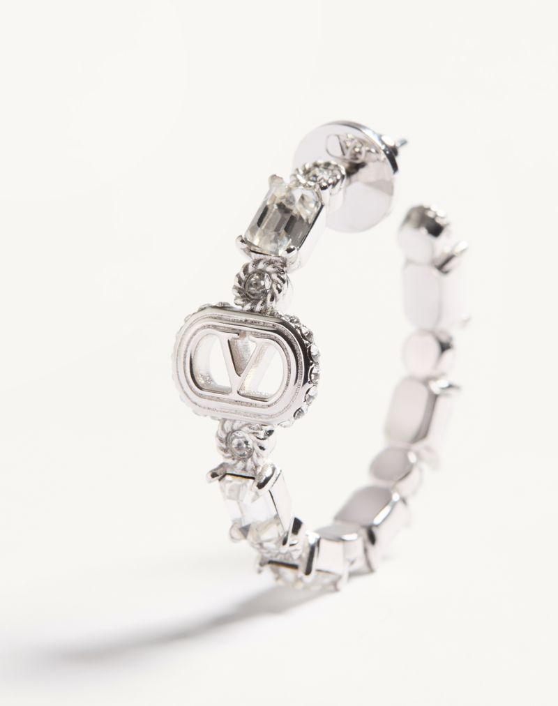 Ovale øreringe i metal og Swarovski® krystaller