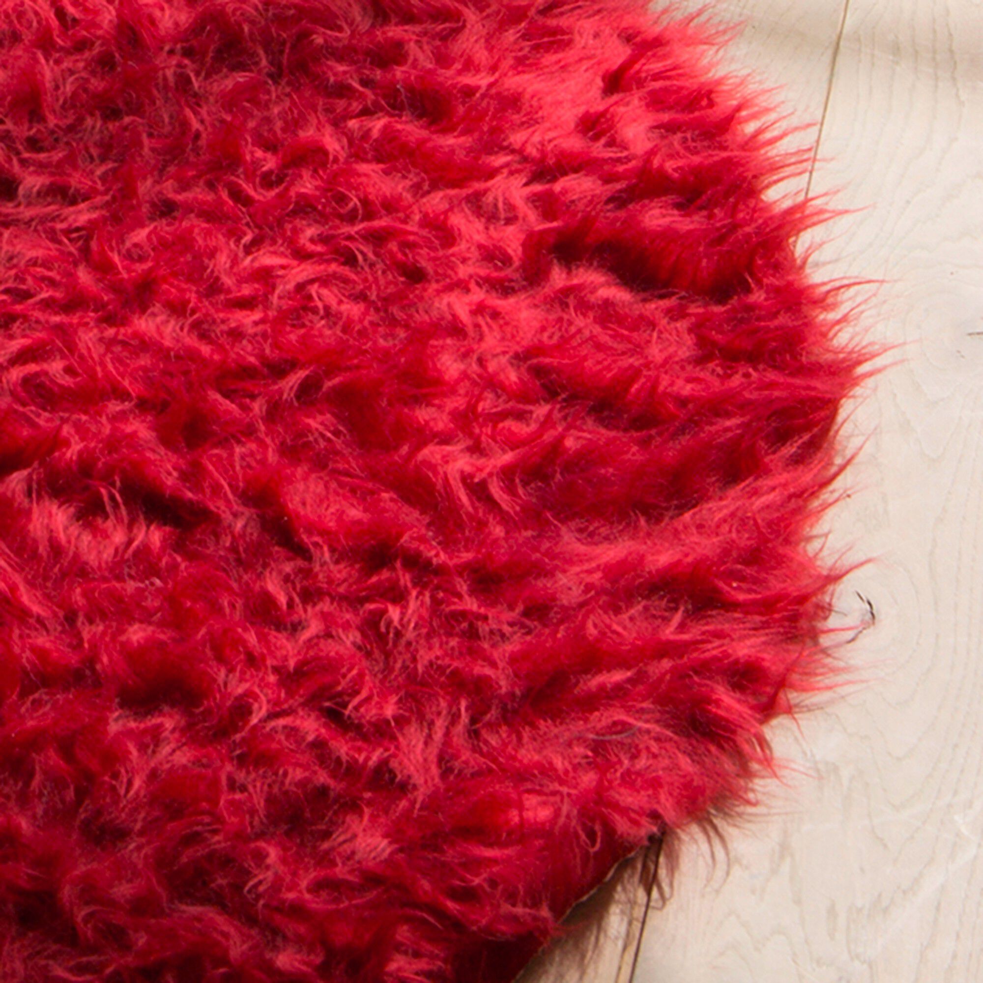 Tapis rond poils longs