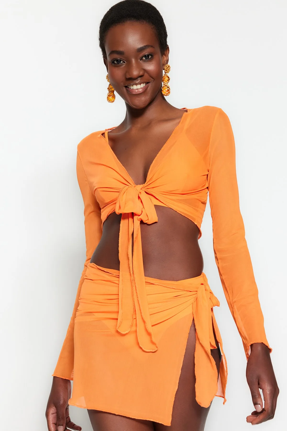 Trendyol Collection  Orangefarbenes Blusen-Rock-Set aus gewebtem, gebundenem Netzstoff TBESS23AU00033