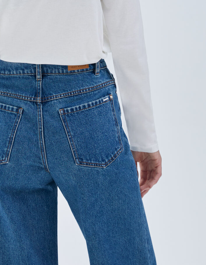 Jean large bleu taille haute 7/8e bas frangés Femme