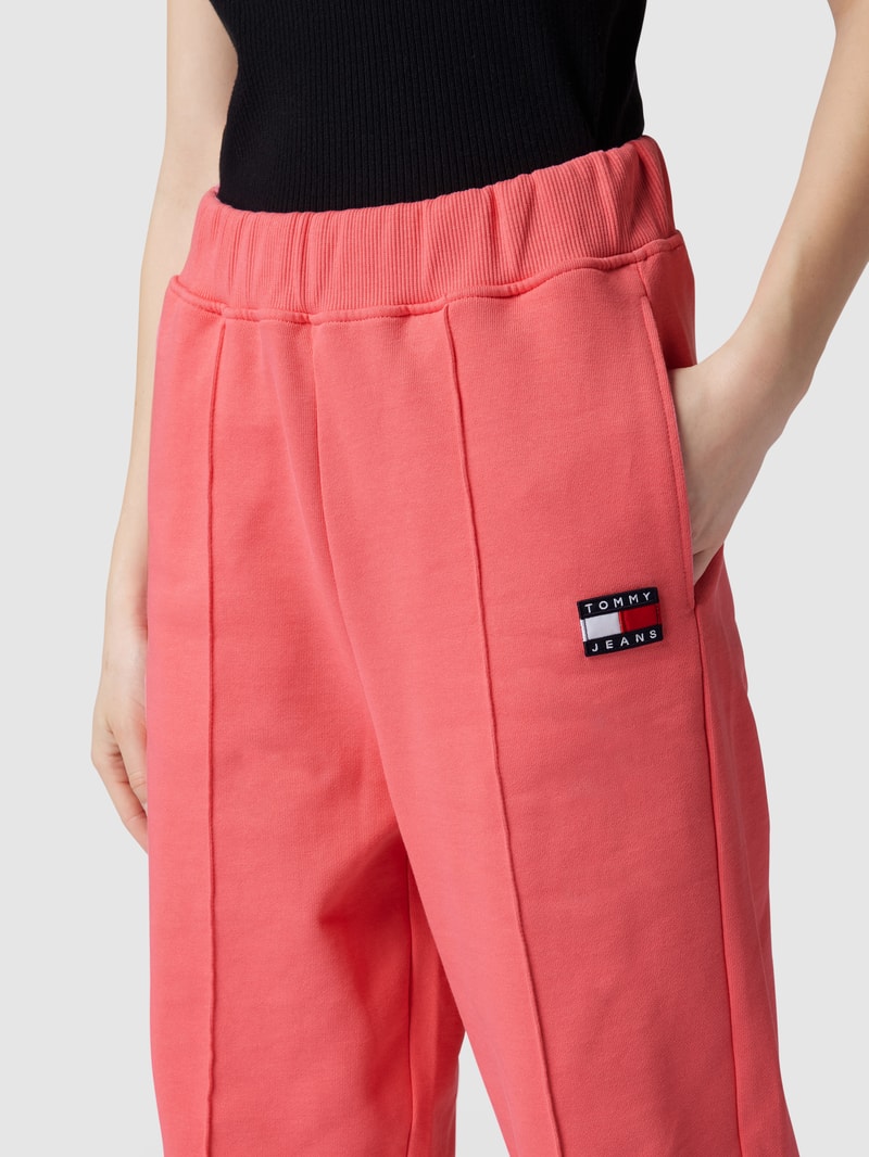 Sweatpants mit Label-Patch in pink