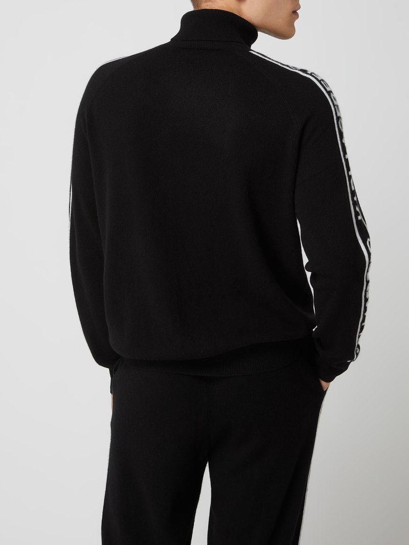 Rollkragenpullover aus Kaschmir in schwarz