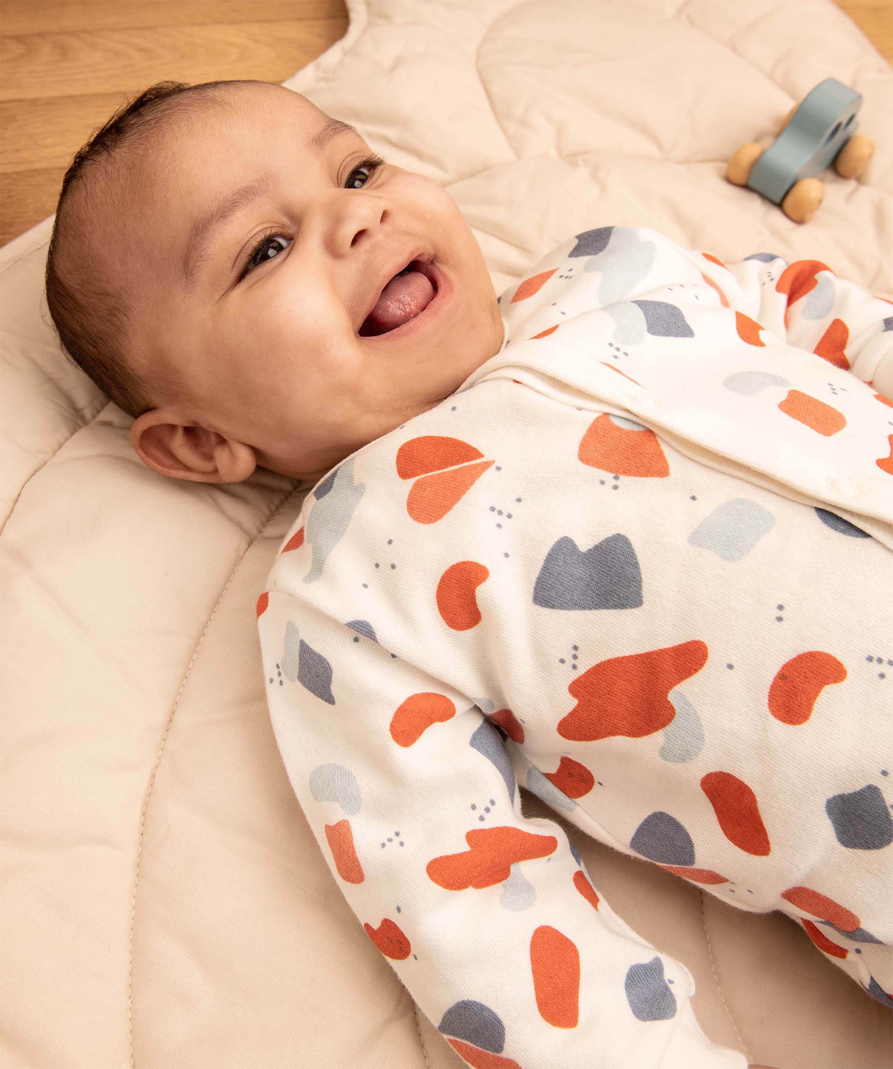 Pyjama bébé imprimé sans pieds avec ouverture devant ecru | GEMO