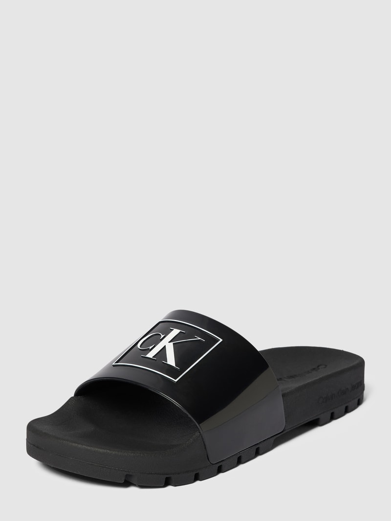 Slides mit Logo-Print Modell 'TRUCK' in schwarz
