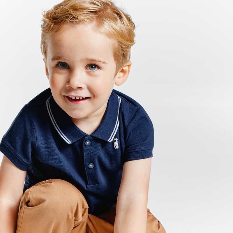 Polo maille piquée uni bleu bébé garçon