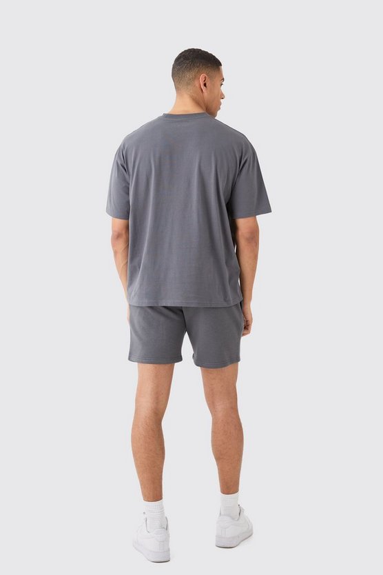 Man Signature T-Shirt und lockere Shorts