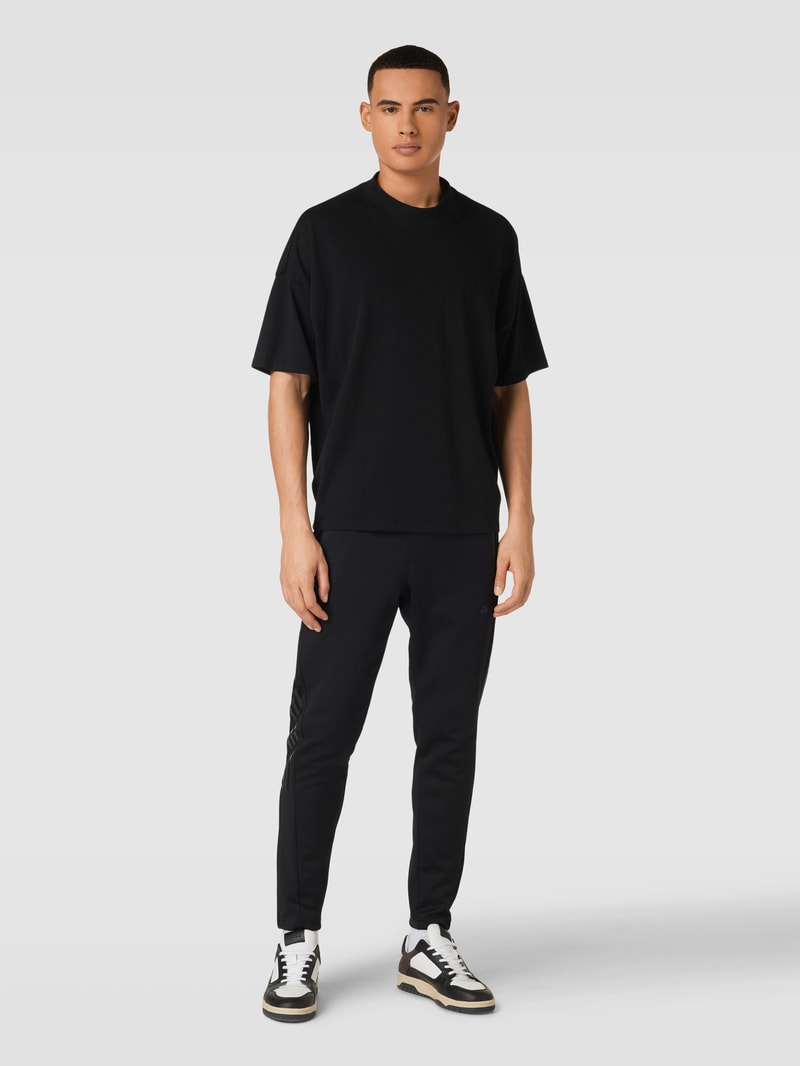Sweatpants mit labeltypischen Galonstreifen Modell 'TIRO' in schwarz