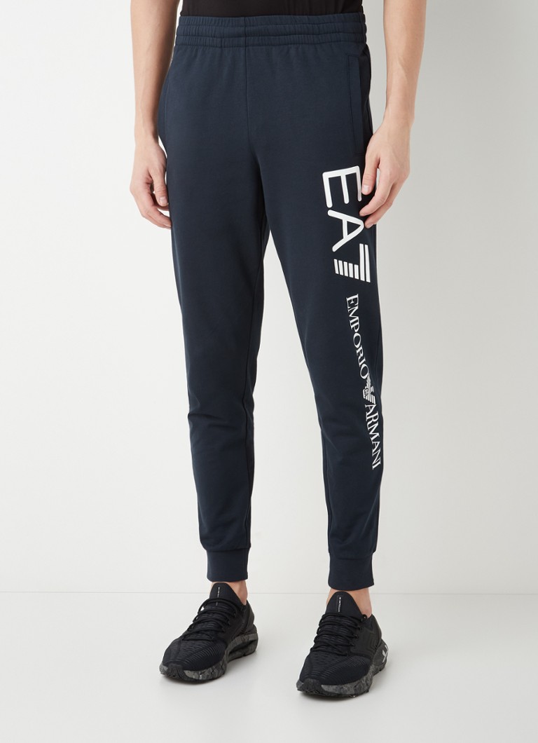 Teplákové nohavice Emporio Armani zúženého strihu s bočnými vreckami a potlačou loga